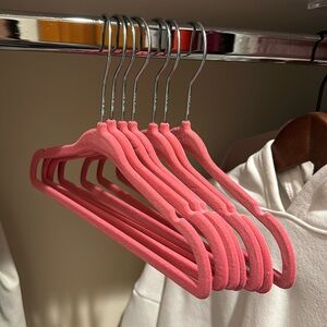 7 bright pink kid hangers